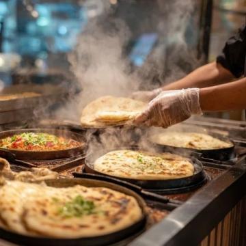 天津自制炸糕遇冷:邻里不再串门品尝的甜蜜烦恼