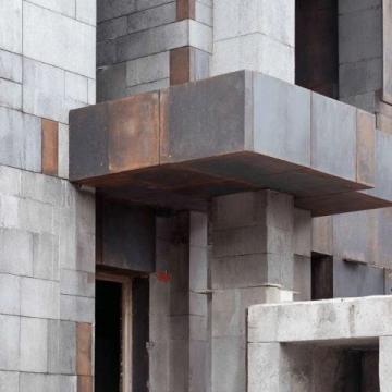 墙固就是指水泥、混凝土等建筑材料固化后的硬性物质。