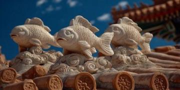 鲤鱼跃龙门:山西黄河峡谷中的古代传说与自然奇观